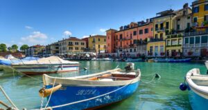 Dal Mincio al Garda: fiori di loto e veliero al tramonto 22 luglio