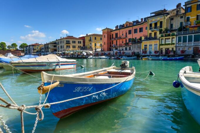 Dal Mincio al Garda: fiori di loto e veliero al tramonto 22 luglio